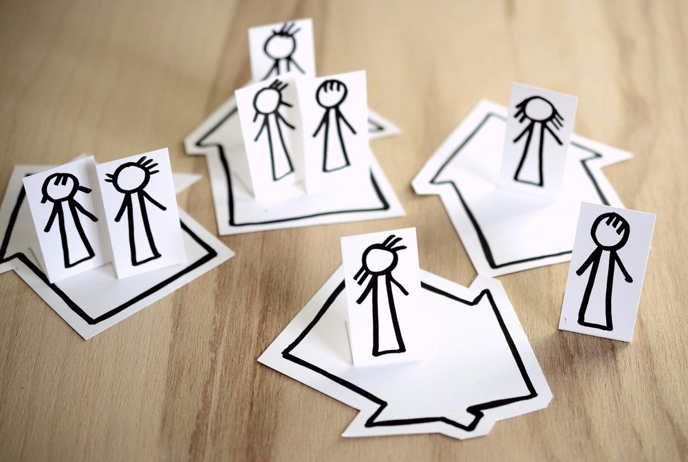 Pictures of stick figures staying home in their own house.