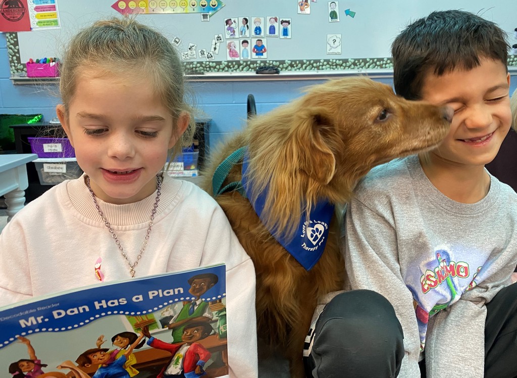 Griffy the Certified Therapy Dog and students